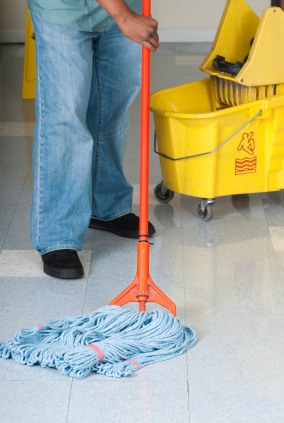 Beyond Clean Janitorial And Detailing LLC janitor mopping floor